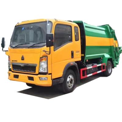 Chine HOWO 4X2 8m3 Garbage Compactor Truck 5tons Waste Collector Truck Compressed Garbage Truck à vendre