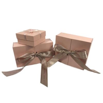 China Hot Selling Wholesale Recyclable Paper Wedding Favor Special Pink Special Luxury Box With Ribbon for sale