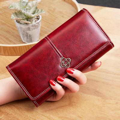 China Waterproof 2022 New Women Long Wallets Oil Lady Border Wholesale Zipper Waterproof Retro Wax Leather Wallet for sale