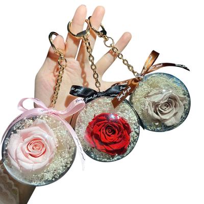 China Promotion Gift Fashion Transparent Plastic Eternal Rose Pendant Flower Key Chain for sale