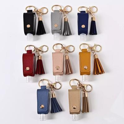 China Flip Reusable Travel Hand Sanitizer Refillable Bottle Promotion Gift Container Leather Key Chain for sale