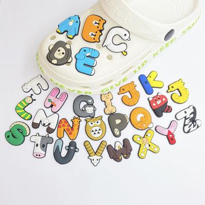 China Custom Clog Charms Hot Christmas Gift Designer Cute Cartoon Alphabet PVC Shoe Charms Shoe Accessories For Shoe Decorations for sale