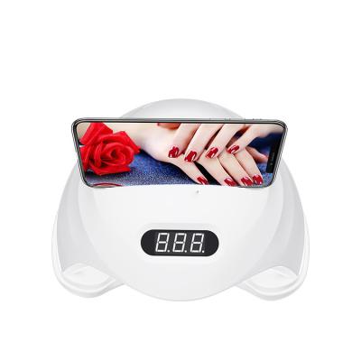 China Best Selling 48W Cordless Nail Dye Beauty Salon UV Led Nail Lamp With Phone Holder for sale