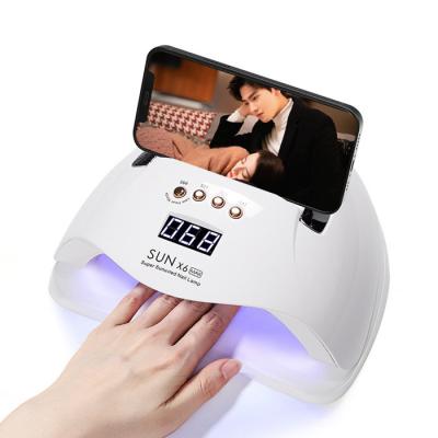 China Nail Drying Device Innovative UV Led Nail Lamp 120W 36 LED Small Nail Lamp With Phone Holder 230*200*105mm for sale