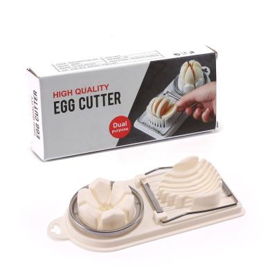 China Amazon New Design Viable Design Egg Tools Kitchen Instruments Stainless Steel Wire Egg Slicers Egg Cutter With Color Box for sale