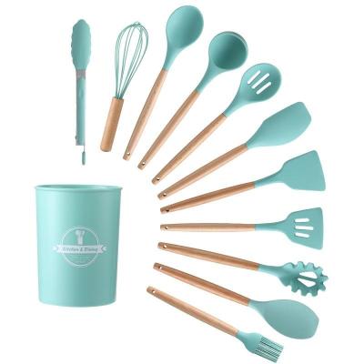 China Non Sustainable Stick Cooking Tools Silicone Kitchen Utensils Set Silicone Utensils Set With Storage Bucket for sale