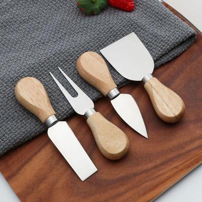 China Unique Viable 4pcs Cheese Knife Tool Kit Bamboo Wooden Handle Stainless Steel Cheese Knife Set For Cheese Pizza for sale