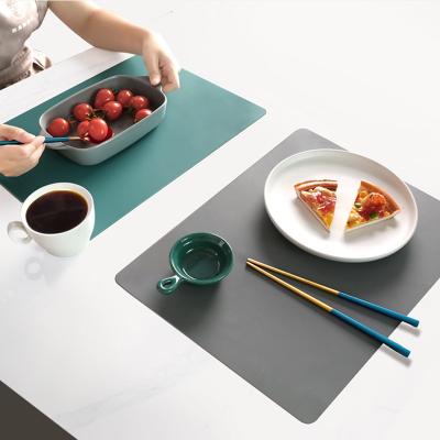 China Sustainable BPA Free Heat Resist Non-slip Waterproof Dinner Mat Table Mat Silicone Kitchen for sale