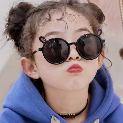 China 2022 fashion sunglasses the new trend of children's sun shade glasses fashion cute bear ears round glasses cartoon kids sunglasses for sale