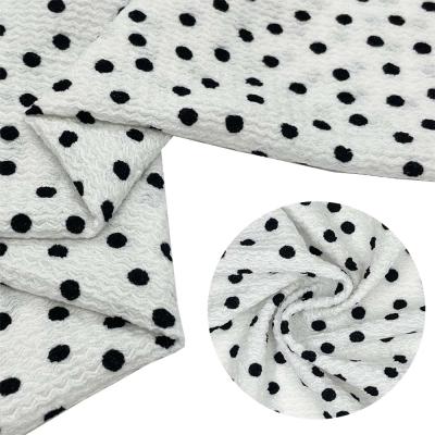 China New 100% Polyester Crepe Fabric Fashion Polka Dot Anti-static Hot Selling Warp Knitted Fabric For Dress for sale