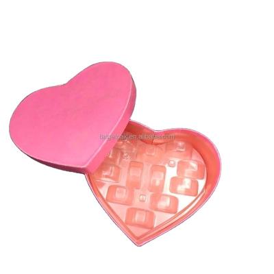 China Recyclable Luxurious Heart Shape Macaron Blossom Gift Box Rigid Red Velvet Rose Lined Chocolate Packaging Box With Plastic Clear PET Insert for sale