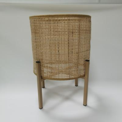 China Eco-friendly Wholesale sea grass planter with leg made in China Vintage rattan wicker plant stand Modern design woven wicker flower pots for sale