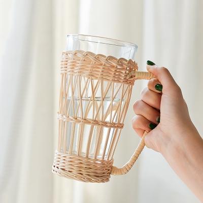 China Amazon Eco-Friendly Vintage Rattan Glass Milk Coffee Cup Wicker Glass Vase With Rattan Cup Holder for sale