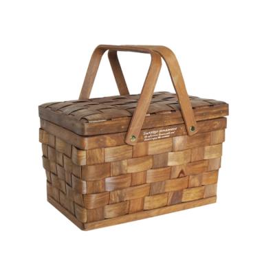 China Modern High Quality Environmental Protection Wood Waste Knitting Portable Retro Style Fruit Food Picnic Storage Basket for sale