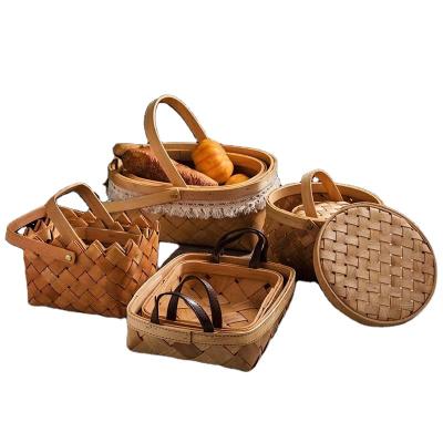 China Viable Wholesale Handmade Woven Wood Waste Fruit Bread Basket Wedding Basket Flower Storage Basket for sale