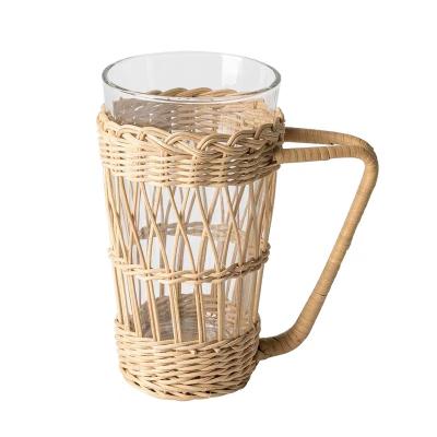 China Recycle Hot Sale Transparent Glass Cup Water Tea Coffee Clear Glass Mug With Rattan Cup Holder With Handle for sale