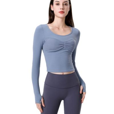 China Breathable Women Long Sleeve Soft Compression Training Running Fitness T Shirts With Pads for sale