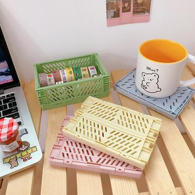 China Sustainable Cosmetic Storage Basket Mini Folding Office Organizer Desktop Plastic Storage Box for sale