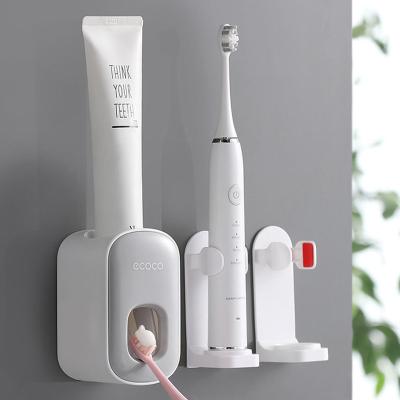 China Stored Toothpaste Dispenser Traceless Toothbrush Holder Bathroom Set Wall Mount Rack Holder for sale