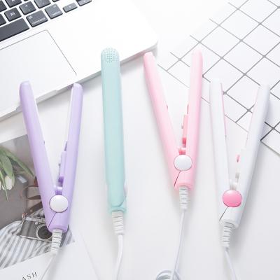 China High Quality Flat Hot Comb Hair Straightener Mini Safety Iron Hair Straightener Curling Iron Styling Tools for sale