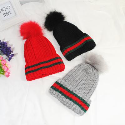 China COMMON Women's Fashion Cozy Winter Bobble Hat Stripe Print Decoration Warm Hat for sale