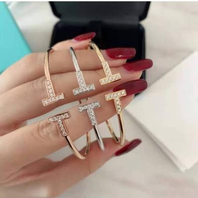 China New Vintage Design Fashion Stainless Steel C Bangle Gold Plated Single Open Double T Bangle For Women Bangle for sale