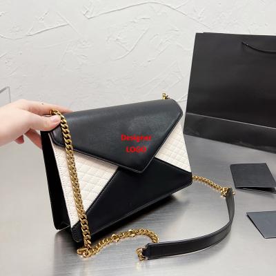 China 2022 Fashion Real Leather Ladies Trendy Designer Clips Women Bags Luxury Handbag With Chain for sale