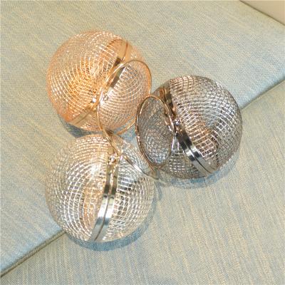 China Daily Wholesale Wedding Party Cross - Body Purse Women Shoulder Bag Gold Caged Round Metal Ball Hollow Clutch Evening Clutch Bag for sale