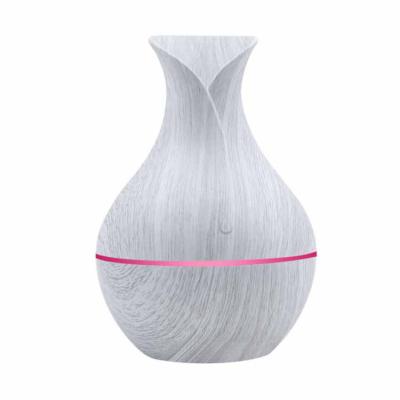 China Creative Car Grain Wooden Vase In Cars On Board Ultrasonic Mini Car Portable Rechargeable Radio Aroma Diffuser Mist Humidifier for sale