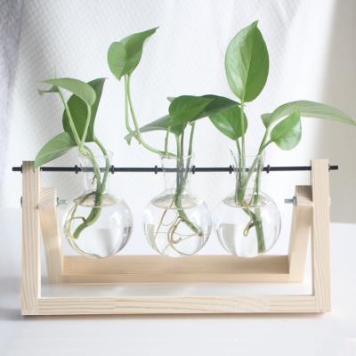 China Art Decor Indoor Plant Terrarium with Swivel Wooden Glass Holder Metal Vase Bulb Planter Air Holder Retro Table Top for Home Decoration for sale