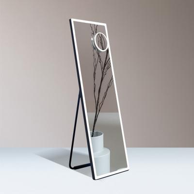 China Luminous High Quality Pattern Designing Floor Standing Dressing Wall Mirror Integral Led Mirror With Lights for sale