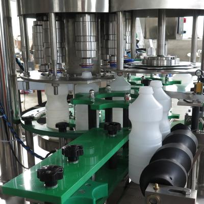 Cina tappatrice automatica 1000ml di 70mm per la certificazione di plastica del CE di acciaio inossidabile della bottiglia in vendita