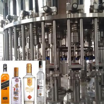 China Roestvrij staal 304 Whiskyalcohol het Vullen Machine die 3000bph afdekken Te koop