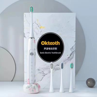 China New Stylish Office Home Hotel Travel Effective Tooth Cleaning Electric Toothbrush Modern Style Wireless Induction Electric Toothbrush for sale