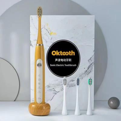 China Customized 5-Function Modes 5-Function High Quality Cheap Rechargeable Sonic Electric Toothbrush Black Silver Gold Battery Dupont Rohs Adult Type White Anti for sale