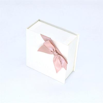 China Small Jewelry Box Custom Materials Simple Cute Bow White Pink Recycled Magnetic Necklace Ring Packaging Box Earrings With Logo for sale