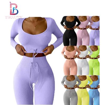 China 2022 Ibeauty New Arrival QUICK DRY Ladies Wears With Stretch Winter Woman Sportswear Set Rib Fabric Fitness Yoga Wear for sale