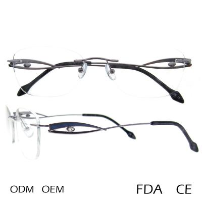 China Hot Selling Newest Design New Products Trendy Glass Eyewear Titanium Diamond Fashionable Rimless Eyeglasses Monocle Optical Frames For Women for sale