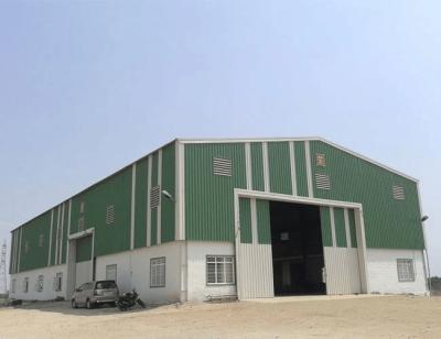 China Glass Wool Insulated Steel Buildings Prefab Industrial Residential Steel Frame Construction for sale