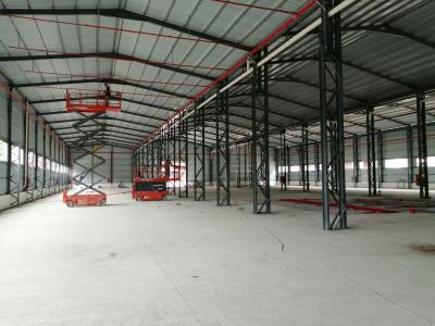 China Hot Dip Galvanized / Painted Steel Structure Warehouse Buildings Pre Engineered for sale