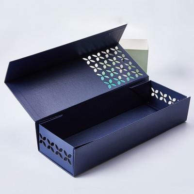 China Handmade Custom Box Magnetic Clamshell Closure Hollow Out Empty Folding Gift Packaging Paper Box for sale