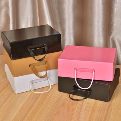 China Recycled Materials Custom Printed Logo Personal Rigid Paper Corrugated Packaging Box Bag With Printing Handle for sale