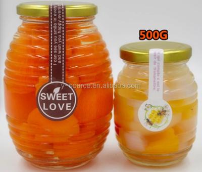 China 750ml Stocked 1000gram Hive Honey Glass Jar with Metal Top for sale