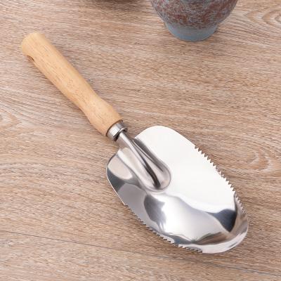 China Stainless Steel Outdoor Wooden Handle New Design Small Garden Shovel DIY Tools for Home Transplanting for sale