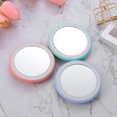 China Lighted Makeup Mirror With Led Lights USB Charging Portable LED Mirror for sale