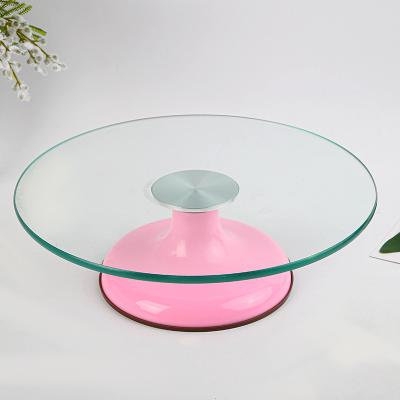 China New Viable Heavy Duty Rotating Metal Cake Stand Props Baking Icing Decorating Tools With Glass Turntable for sale