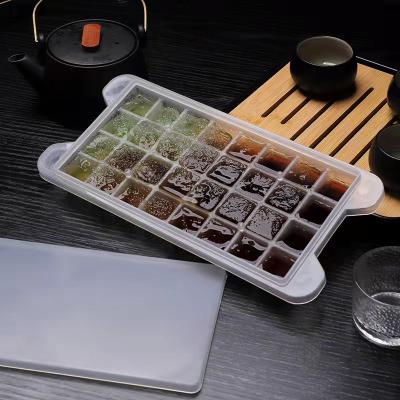 China Viable Summer Square 32 Grid Ice Cube Box Creative Ice Tray With Lid PP Plastic Ice Cube With Extra Lid DIY Food Box for sale