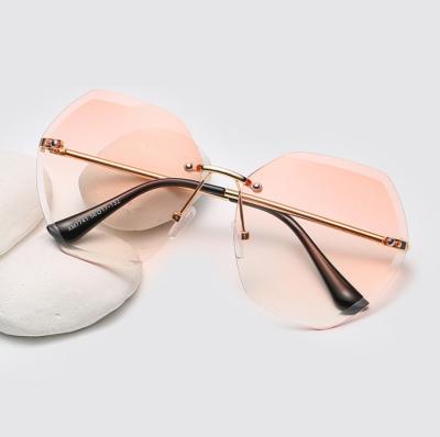 China Hot Sale Oversized Luxury Fashion Sunglasses Women Rimless Sunglasses Trendy Metal SP7741 Custom Made In Stock for sale