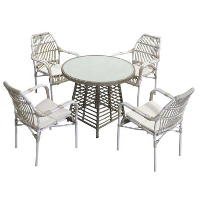 China Waterproof And UV Resistance Modern Patio Garden Rattan Round Dining Metal Set Restaurant Table Chair for sale