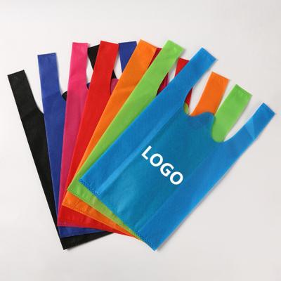 China Reusable Wholesale Eco-friendly Vest Bags Nonwoven Supermarket Tote Bags Market Shopping Bag Durable And Degradable Custom Logo for sale